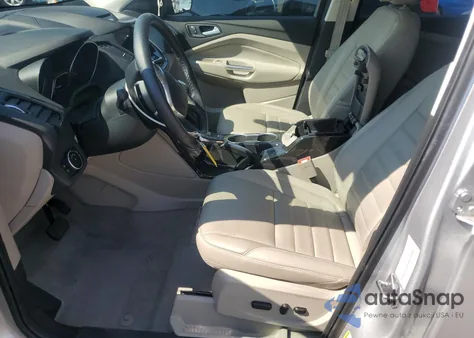 2016 Ford Escape Titanium z USA, uszkodzony, nr VIN 1FMCU0J93GUC64715